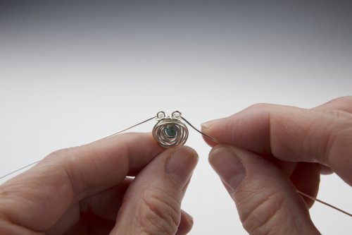 Susan Barzacchini's Infinity Rose Wire Bracelet - Making the Four Rose Link Loops, Contemporary Wire Jewelry, Coiling, Coiling Wire, Wire Coiling, Wrap the right wire around the base 